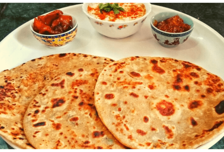 Mooli Paratha: सर्दियों के मौसम में ऐसे बनाएं स्वादिष्ट मूली का पराठा,पेट भर जाएगा पर मन नहीं